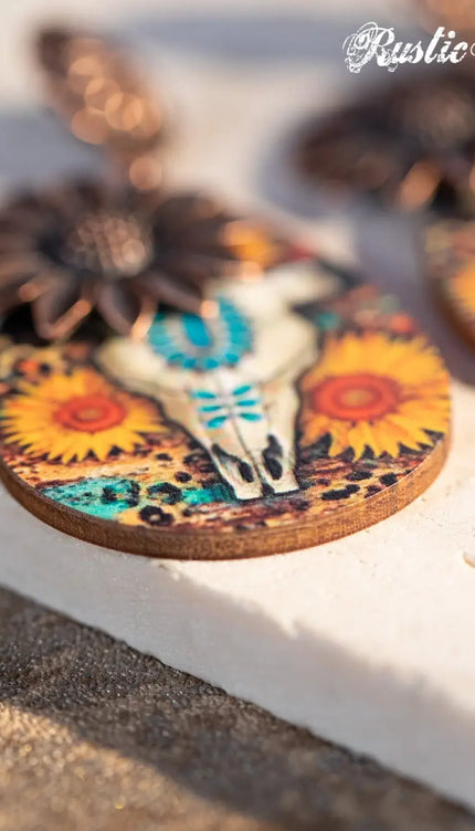 Couture’s Sunflower Painted Bull Skull Sunflower earrings