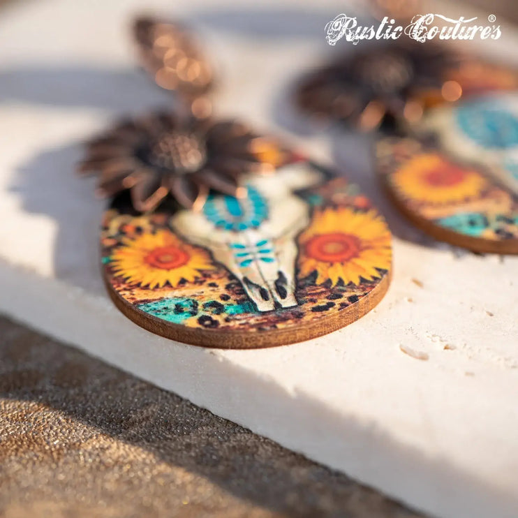 Couture’s Sunflower Painted Bull Skull Sunflower earrings